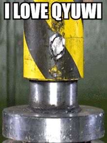 a yellow and black pole with the words i love qyuwi written on it