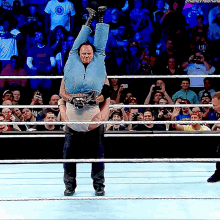 The Undertaker Tombstone Piledriver GIF - The Undertaker Tombstone Piledriver Luke Harper GIFs