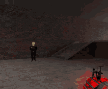 a dark room with a white wall and a red hand holding a gun