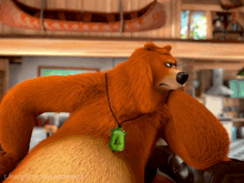 a cartoon bear wearing a green necklace with the number 4
