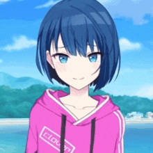 a girl with blue hair and blue eyes is wearing a pink hoodie and smiling .