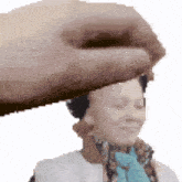 a pixelated image of a woman being slapped on the forehead