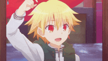 a boy with yellow hair and red eyes is holding a red heart in his hand