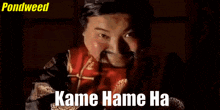 a man with a fake mustache and the words kame hame ha above him