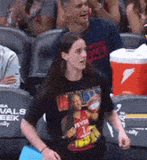 a girl wearing a t-shirt that says fever 1 on it