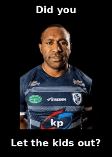 a black and white photo of a man wearing a rugby shirt .