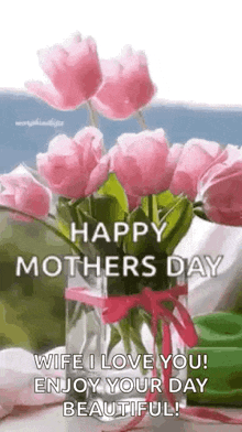 a vase filled with pink flowers with the words `` happy mothers day wife i love you ! enjoy your day beautiful ! ''