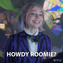 a girl with pink hair and a purple jacket is smiling and says howdy roomie