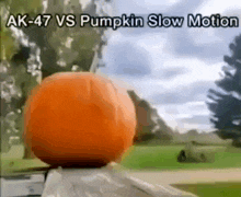 Ak-47 Vs Pumpkin Slow Motion тыква GIF - Ak-47 Vs Pumpkin Slow Motion тыква ак-47 против тыквы GIFs