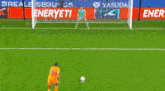 a soccer player with the number 15 on his jersey kicking a ball