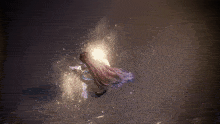 a woman with long hair is floating on the water
