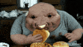 a man with a huge face is eating a hamburger with the watermark minimax