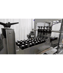 Volumetric Liquid Filling Machine Pressure Liquid Bottle Filling Machine GIF