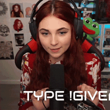 a woman wearing headphones is sitting in front of a microphone with the words type ! give ! written below her