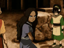 a group of cartoon characters are standing next to each other and one of them is looking at the camera