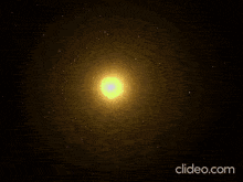 a video of a yellow circle with the words clideo.com on the bottom right