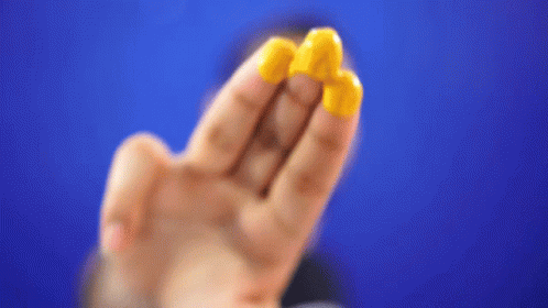 turmeric and curcumin supplements on face GIF