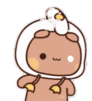 a cartoon bear is wearing a white hat with a duck on it 's head .
