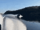a boat is going through a body of water