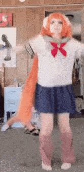 a girl in a costume is dancing in a room