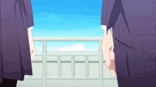 a couple of people standing next to each other with a blue sky in the background