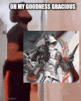a man standing next to a picture of a knight with the words oh my goodness gracious
