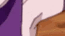 a close up of a purple and brown object .