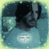 a man with a beard wears a t-shirt that says jonathan loves neo