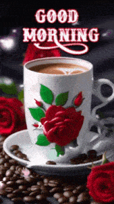 a cup of coffee with a red rose on it and a saucer of coffee beans .