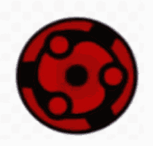 a close up of a red and black circle with a black center on a white background .