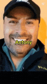 a close up of a man 's face with the name antony on his face