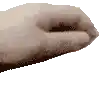 a close up of a person 's hand with their fingers crossed on a white background .