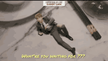 a man in a suit and tie is laying on a table with chopsticks and the words what 're you waiting for