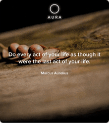a quote by marcus aurelius is displayed on a wooden surface