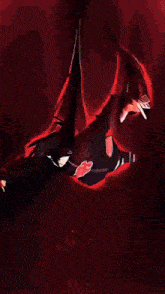 a person is flying through the air in a red background