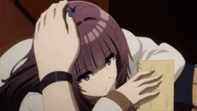 a girl with purple hair is laying down with her head in her hands
