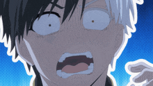 a close up of a person with their mouth open