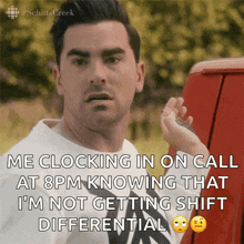 a man is holding a key in front of a red van and says me clocking in on call