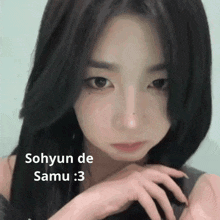 a close up of a girl with the words sohyun de samu : 3 below her