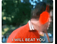 a blurry picture of a man wearing headphones with the words " i will beat you "