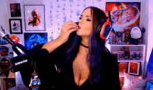 a woman wearing headphones and a shure microphone in a room