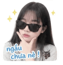 a girl wearing sunglasses is making a funny face with her hand to her chin .