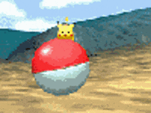 a pikachu is sitting on top of a red and white ball .