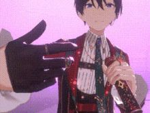 a close up of a person 's hand holding a microphone .