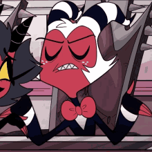 a cartoon character with horns and a bow tie has a very angry look on his face