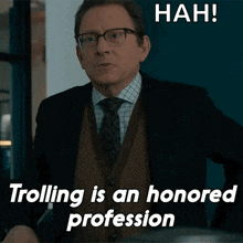 a man in a suit and tie says trolling is an honored profession hah