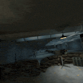 a person holding a gun in a video game with an arrow pointing to it