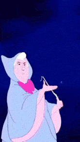 a person in a white dress is holding a wand