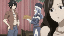 a man and a woman are standing next to each other with a woman holding a tray of cookies