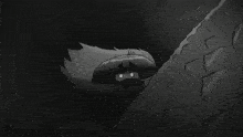 a black and white drawing of a man with a light coming out of his eyes